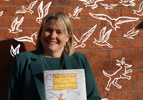 Simone Eirth with her favourite book to teach in celebration Children's Book Week of 