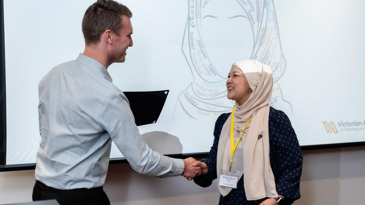 TEP graduate receiving certificate