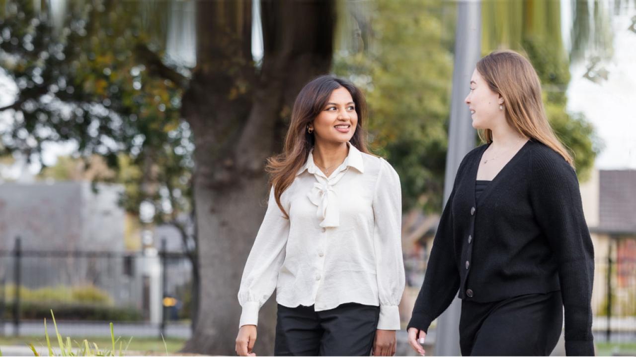 two new female teachers walking through the school