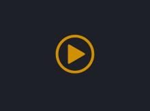 gold coloured video graphic on a dark grey background