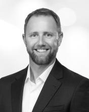 Headshot of Adam Hogan