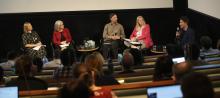 AI Symposium Panel Discussion in an auditorium
