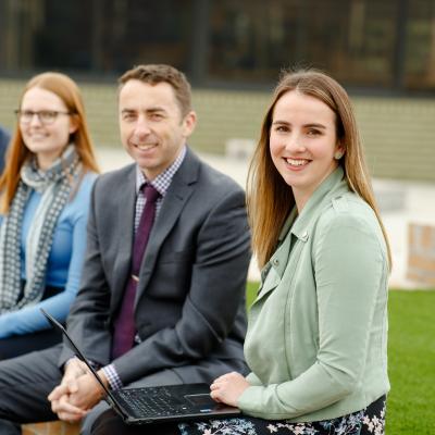 Group of teachers sitting outdoors