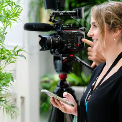 Producer and cameraman in a recording session