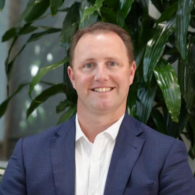 Headshot of Adam Hogan